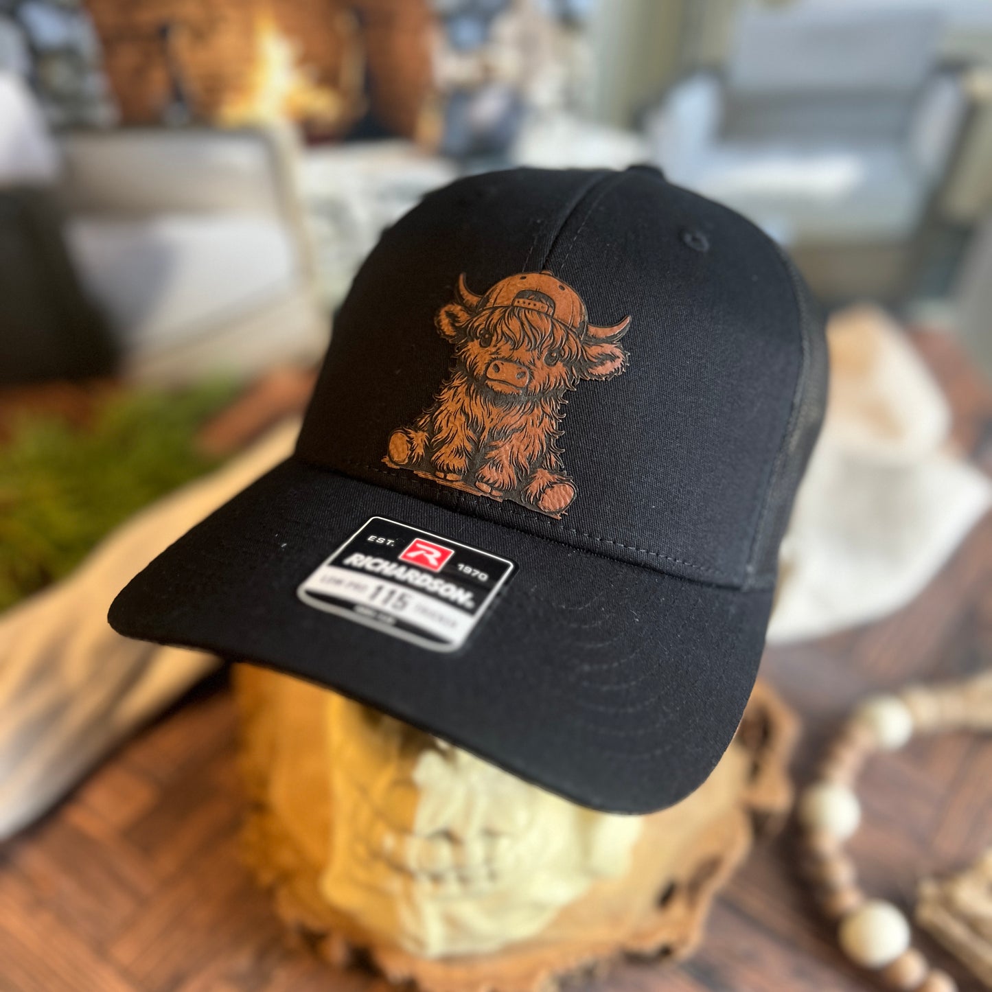 Highland Cow with hat on Richardson 115 Trucker Hat