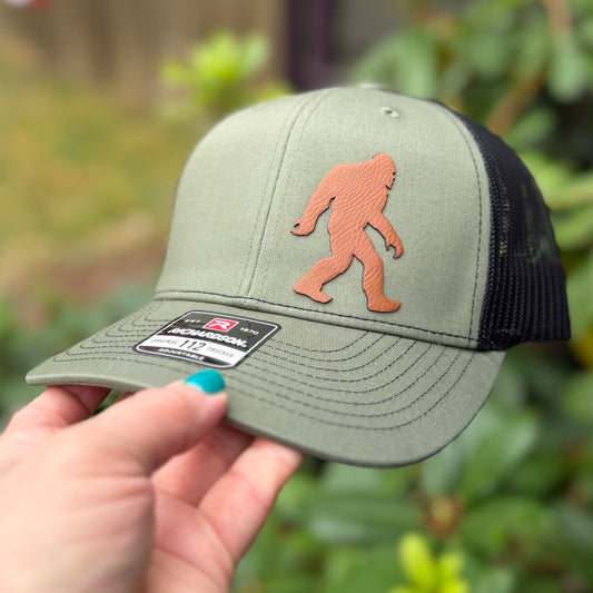 Silhouette of Bigfoot Richardson 112 Loden/Black Trucker Hat