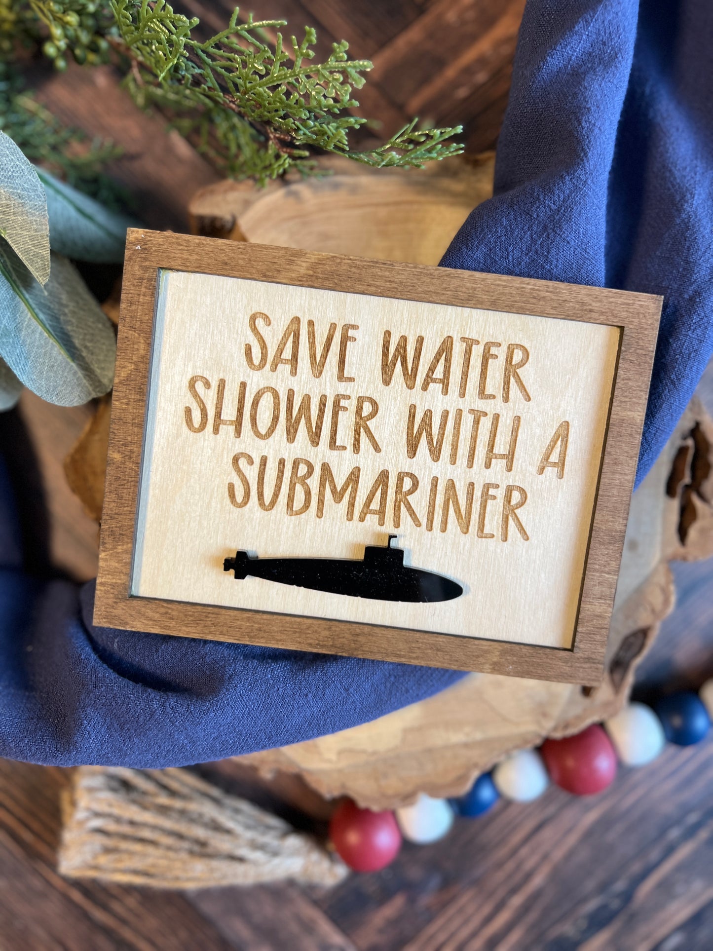 Save water shower with a submariner sign